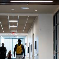 Students walking through the hallway